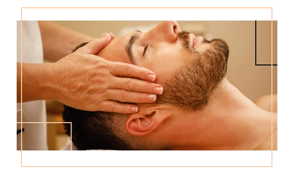 man receiving head massage